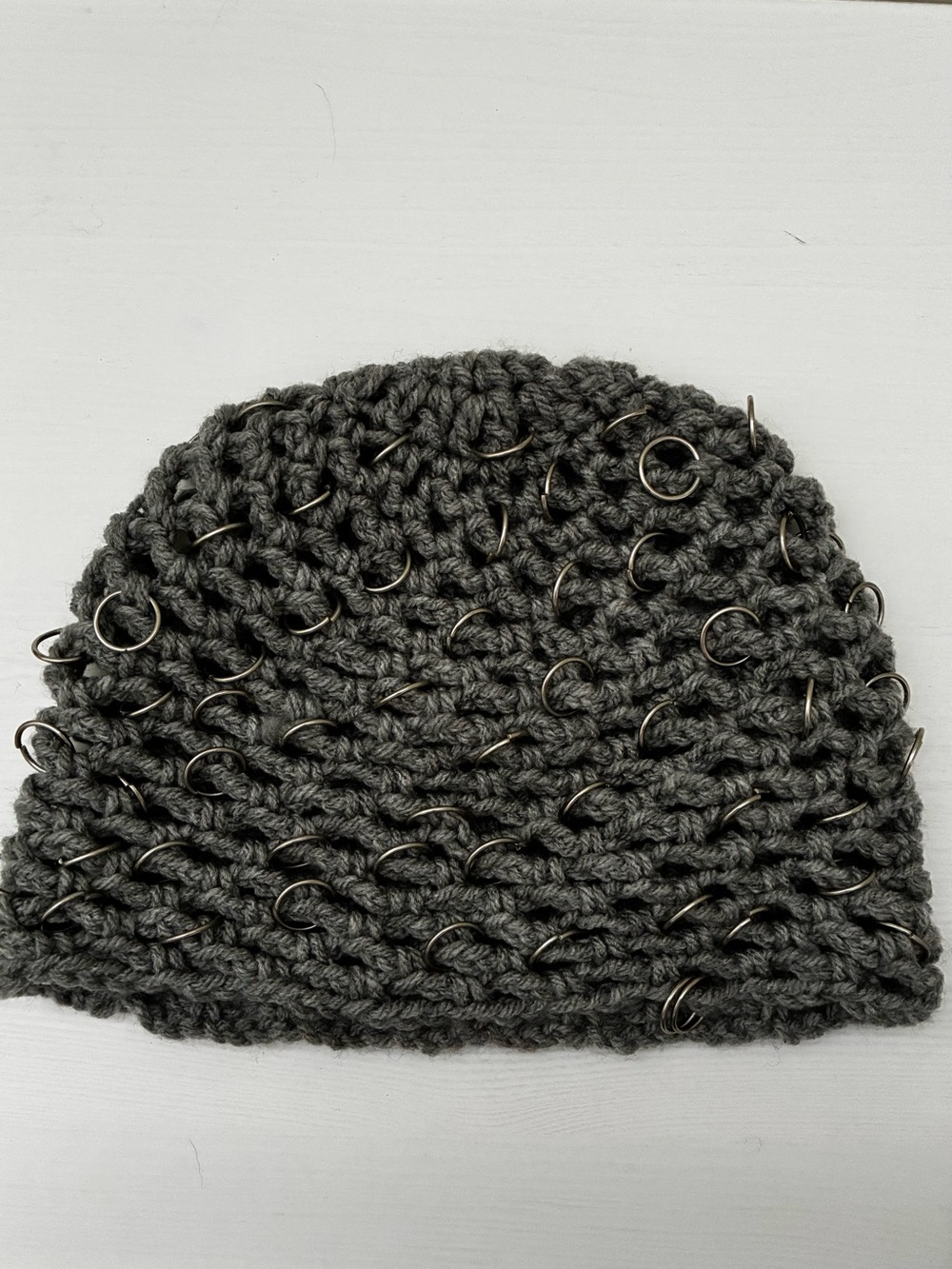Handmade cable-knit piercing beanie